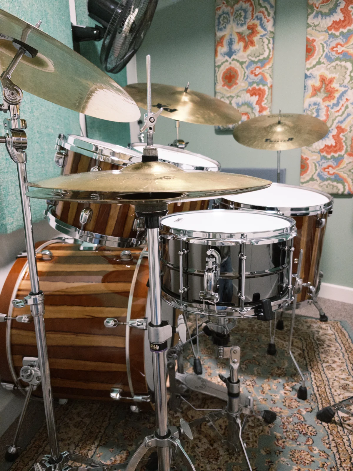 Pod 2, featuring a brown Tama Starclassic drum kit and World Max brass snare